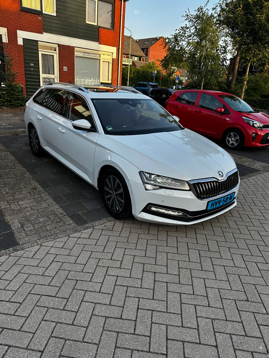 Witte Skoda taxi - A&M Top Service